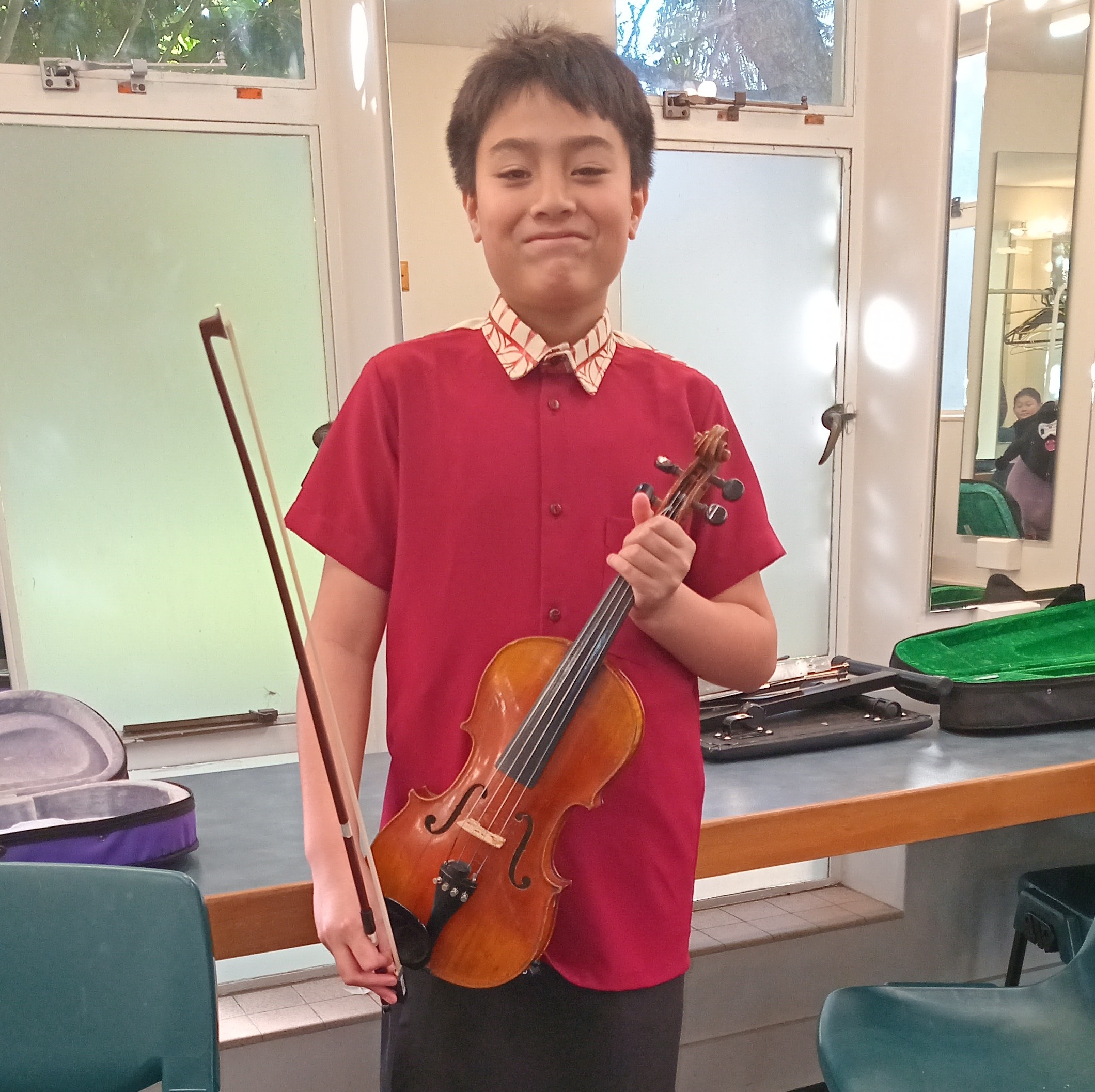 Young musician backstage at a Hutt concert